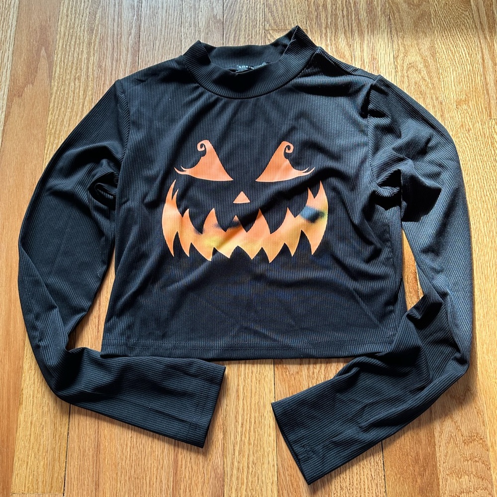 Halloween jack o lantern face crop top
